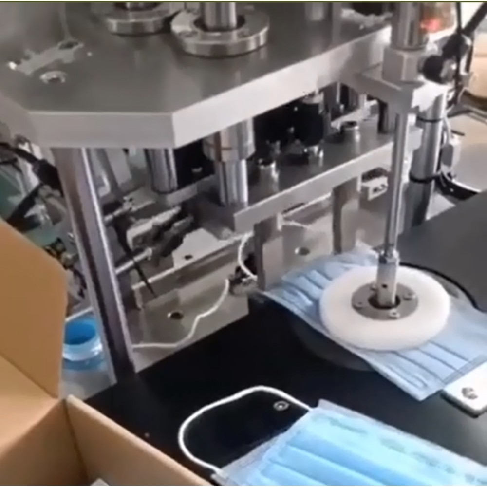 Masina semiautomata cu ultrasunete de lipit elastic la mastile medicale